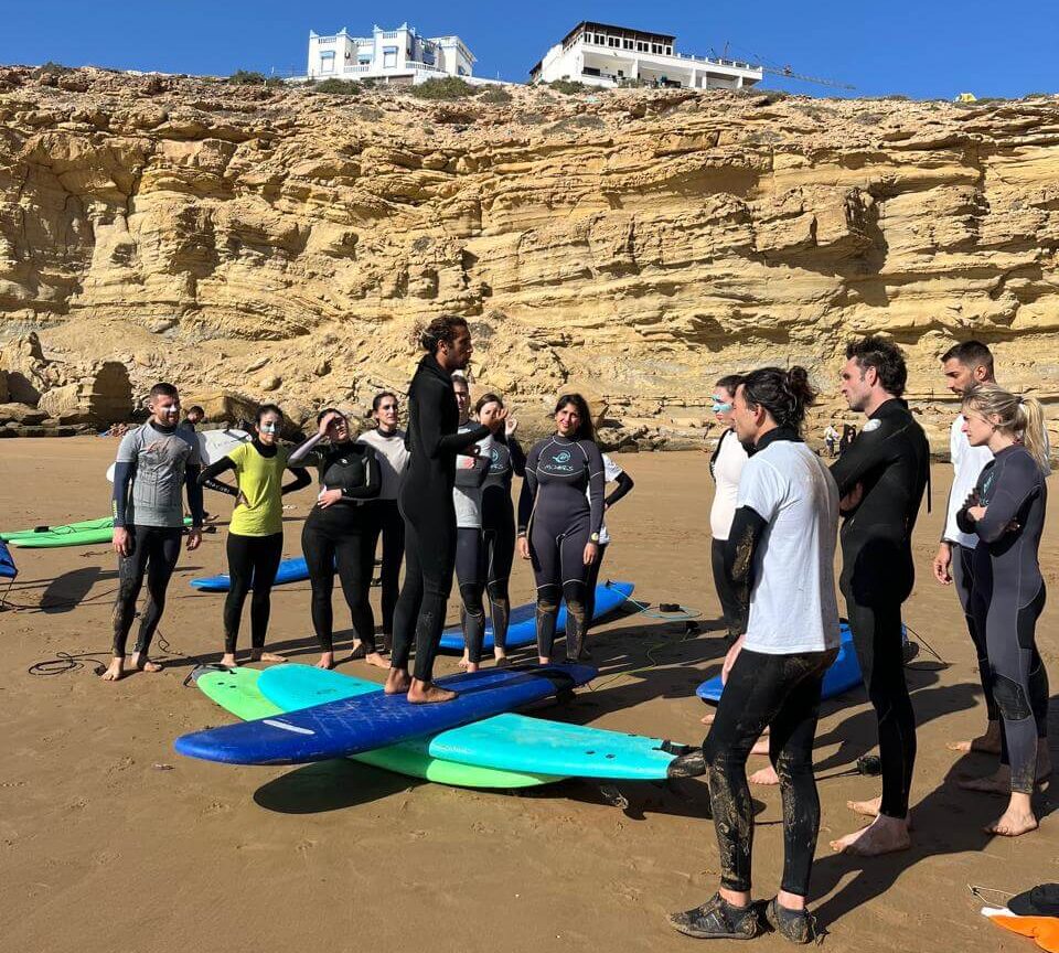 Surf Camp guests practicing balance on the beach