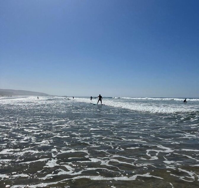 First time surfing and catching the first wave