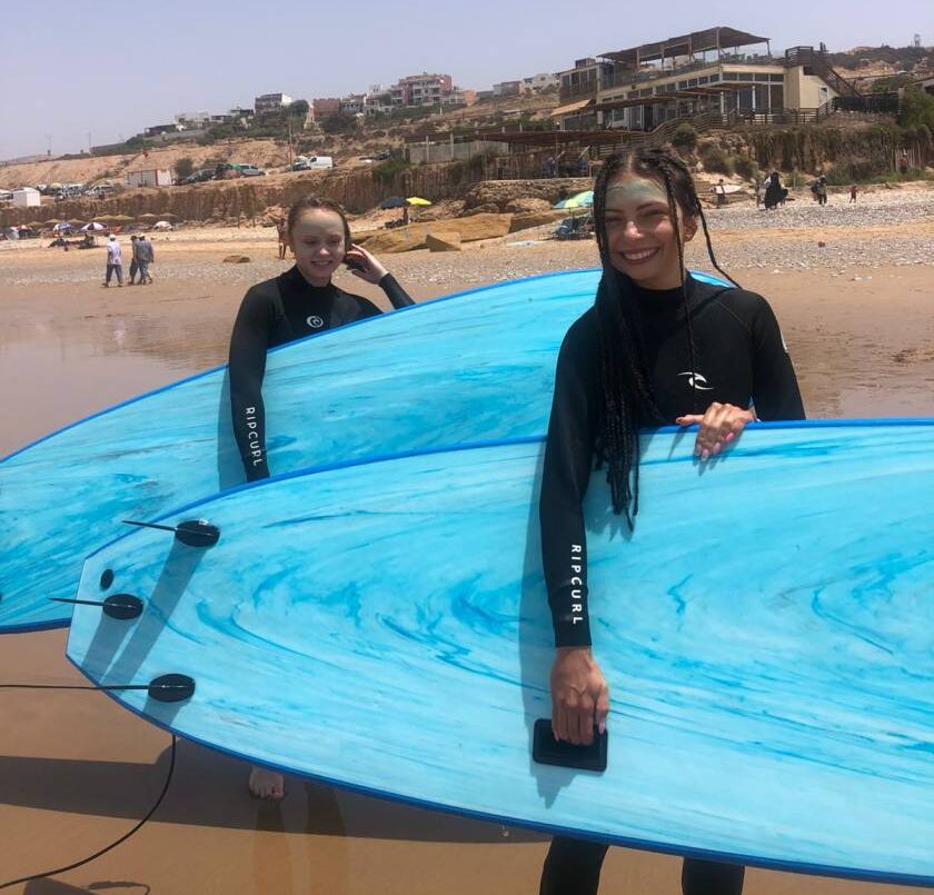 Girls enjoying their summer surf holiday