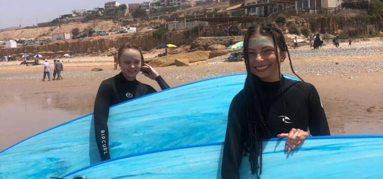 Girls enjoying their summer surf holiday