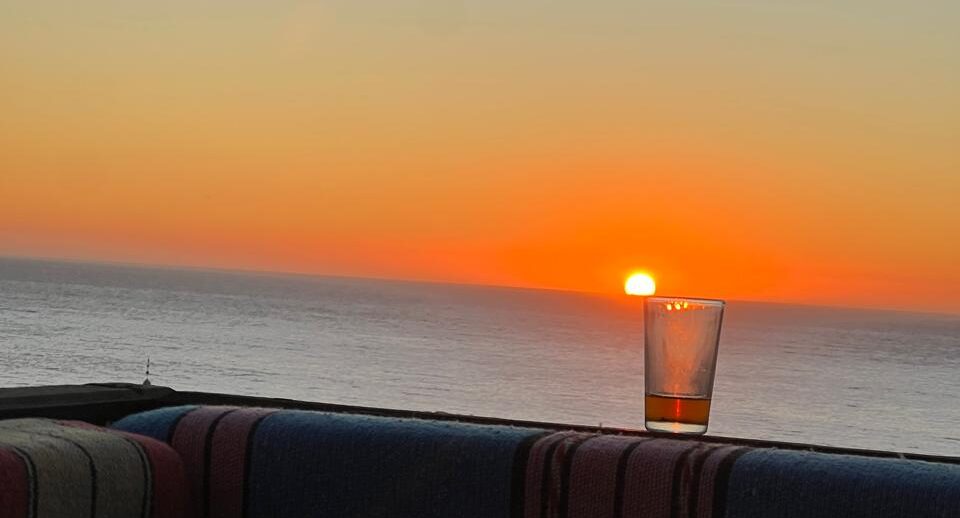 Moroccan Hospitality: enjoying tea session at sunset time
